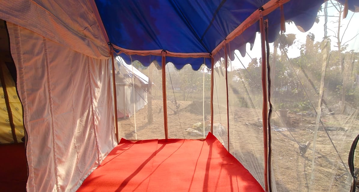 Tent interior with red carpet